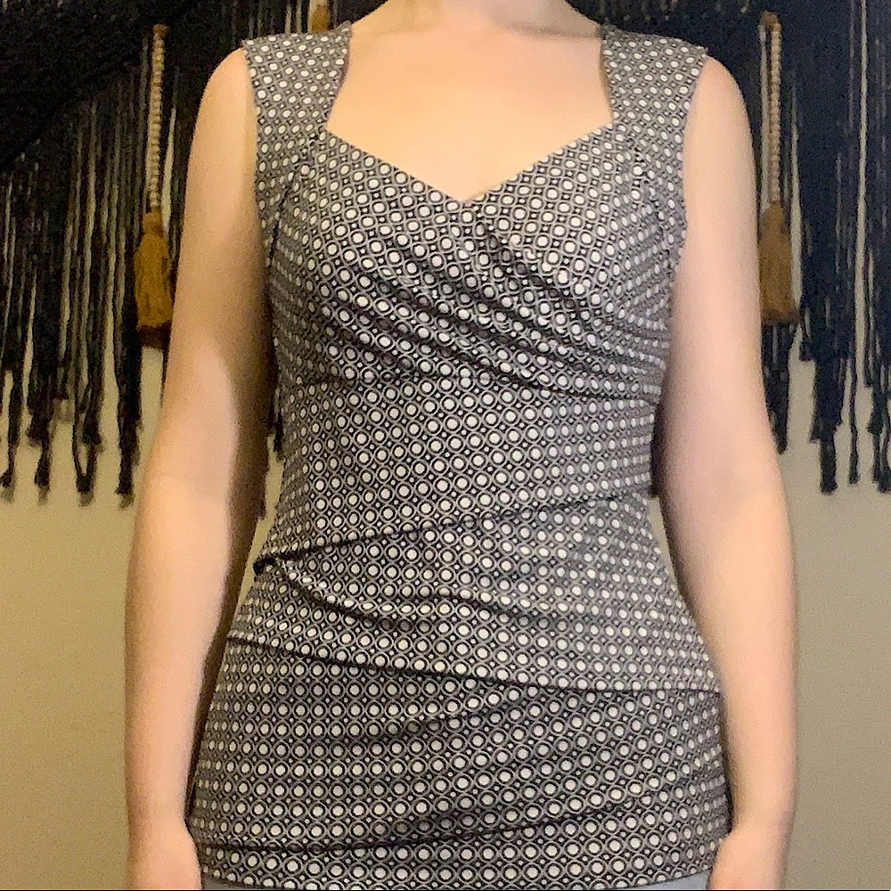 White House Black Market sleeveless blouse. Size M.